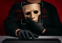 Thai sports news outlet hijacked by illegal gambling website Criminal holding mask