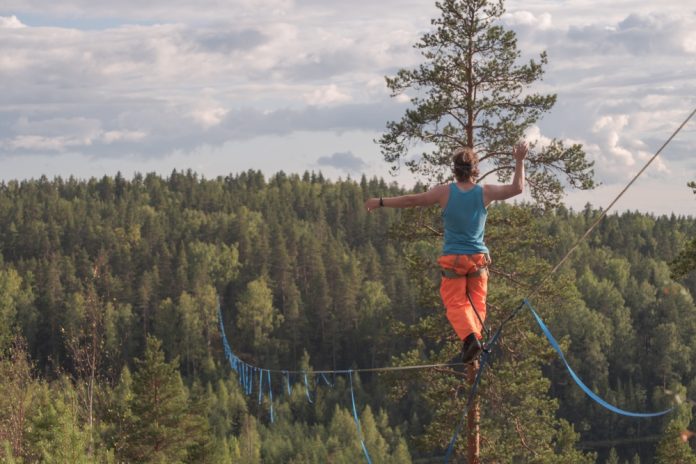 man on tightrope