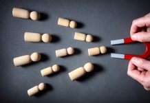 SlotMatrix: how franchise slots and bespoke content drive player retention in 2026 magnet attracting people