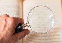 UK Government calls out Gambling Commission on FRAs clarity Magnifying glass