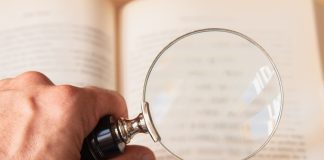 UK Government calls out Gambling Commission on FRAs clarity Magnifying glass