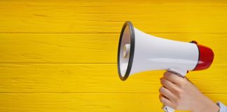 Amusnet’s CPO: where is iGaming’s position in the attention economy? megaphone on yellow background