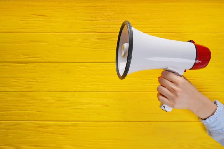megaphone on yellow background