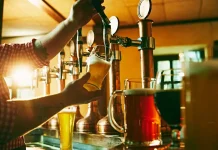 Why Burnham risks watering down pub backing with gambling tax focus Pint being poured